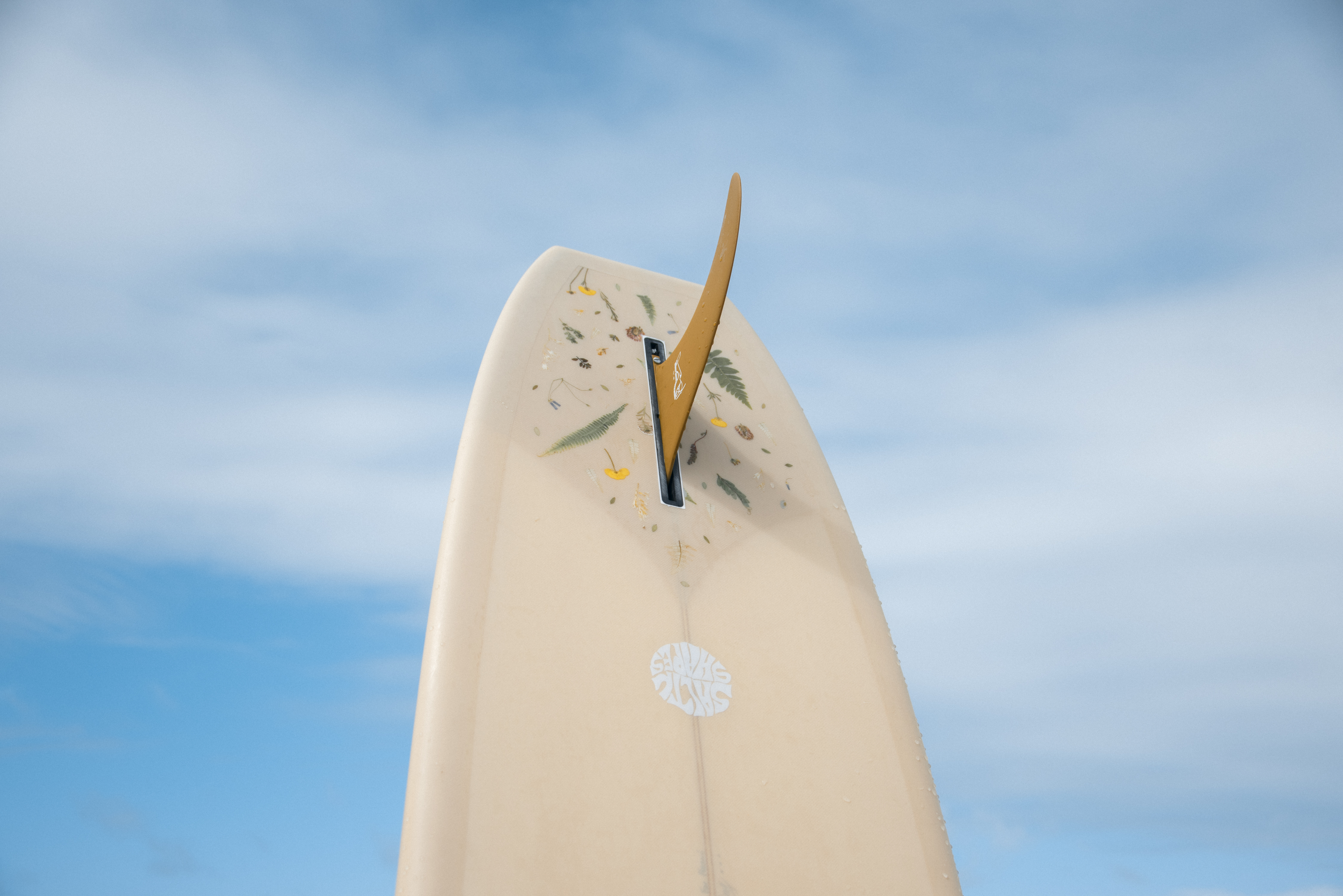 Pressed plant material incorporated into Plant Lady surfboard